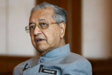 Malaysia ex-PM Mahathir, 97, discharged from hospital after COVID treatment