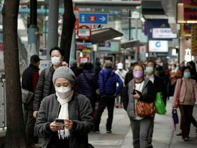 On COVID alert, more Chinese cities advise residents to stay put for holiday