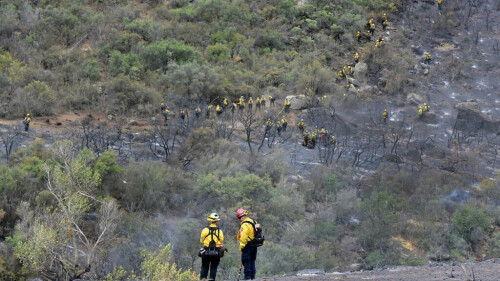 Massive California fire eases with rains
