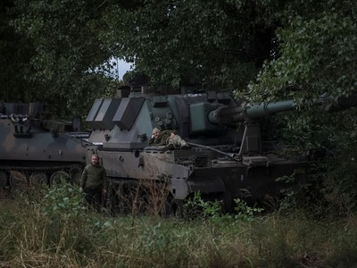 Ukraine leader promises victory during frontline town visit as Russia digs in