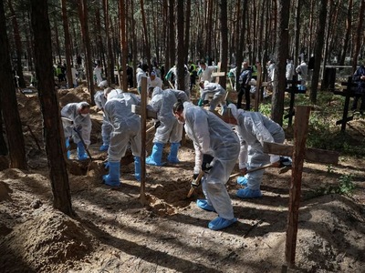 Ukraine's Zelenskiy says two more burial sites found in liberated Izium