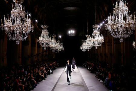 Under a cloud of belt-tightening, Paris Fashion Week struts on