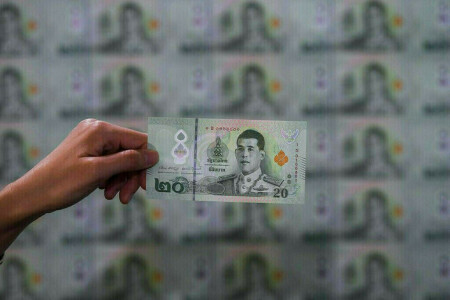 Asia FX broadly flat as investors brace for US inflation data