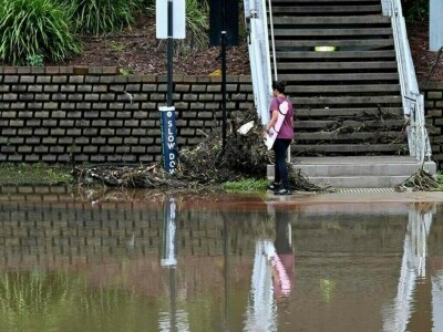 Flooded Australian towns ready levees, sandbags ahead of more rain