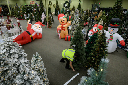 US retailers battle high costs clearing Christmas stockpiles