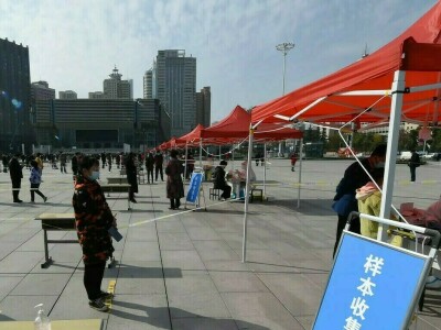 China COVID numbers rise, as cities cut back on testing