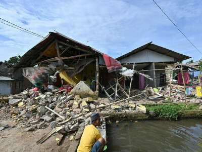 Indonesian girl, 7, found dead after day-long quake rescue effort