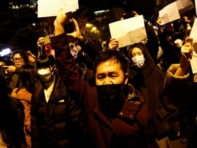 China COVID cases hit fresh record high after weekend of protests