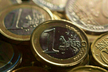 Euro zone yields slip as investors weigh rate outlook