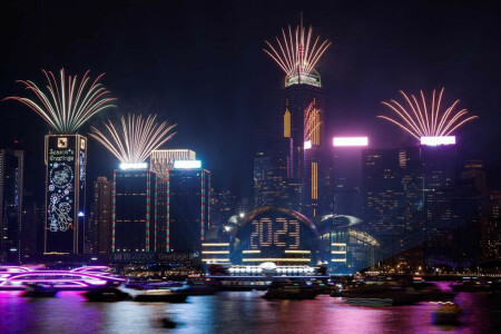 World welcomes 2023 and leaves a stormy year behind
