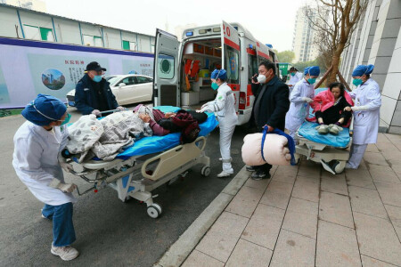 China state media plays down severity of COVID wave before WHO meeting