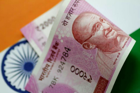 Indian rupee to start important week muted, equity flows watched