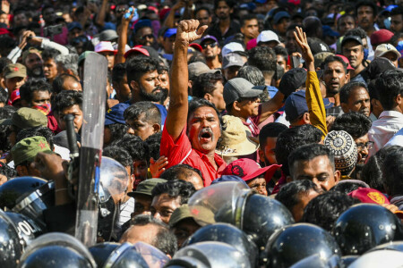 Sri Lanka outlaws strikes as anti-tax protests spread