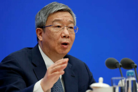 China retains central bank chief in unexpected move