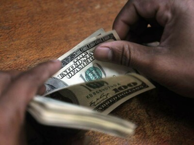 Dollar slips as Fed outlook shifts