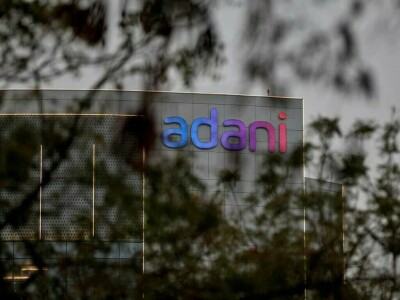 Adani shares tumble on report group seeking time to pay ACC, Ambuja debt
