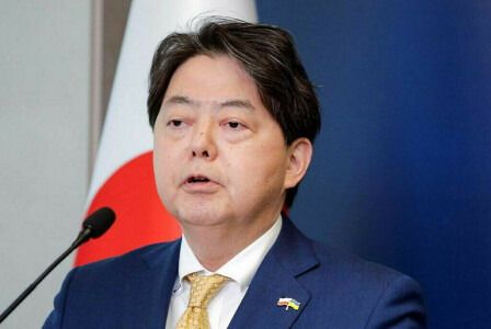 Japan&rsquo;s foreign minister calls for early release of detained national during talks in China