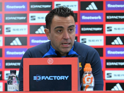Xavi expecting &lsquo;wounded&rsquo; Madrid to wage war in cup Clasico