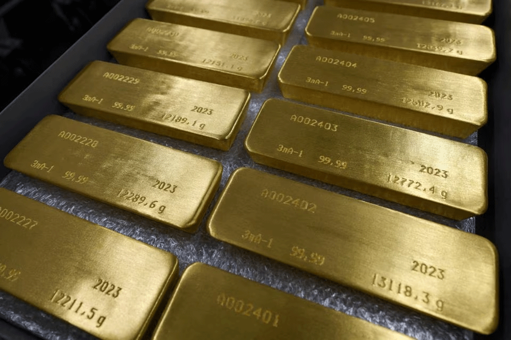 Gold set for monthly gain on economic woes, softer dollar