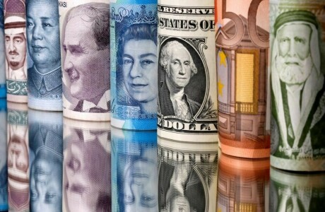 Currencies in limbo awaiting packed week of central banks