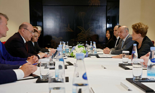 Russian PM in China for talks with Xi, business forum