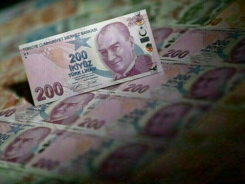 Turkish lira touches record low near 23.4 overnight