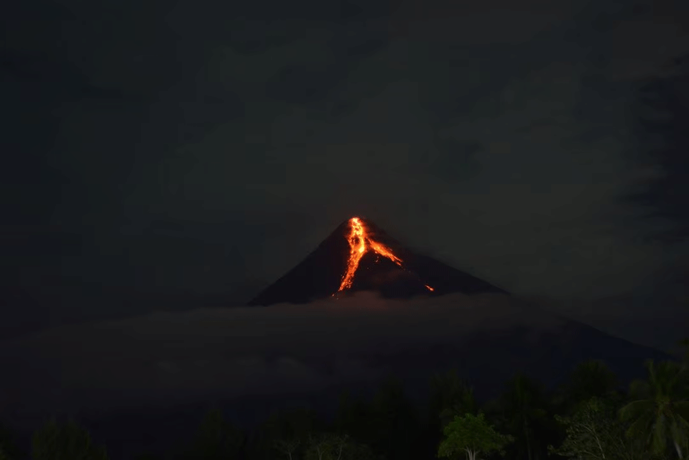 Residents in for months-long displacement as Philippine volcano spews lava, gases