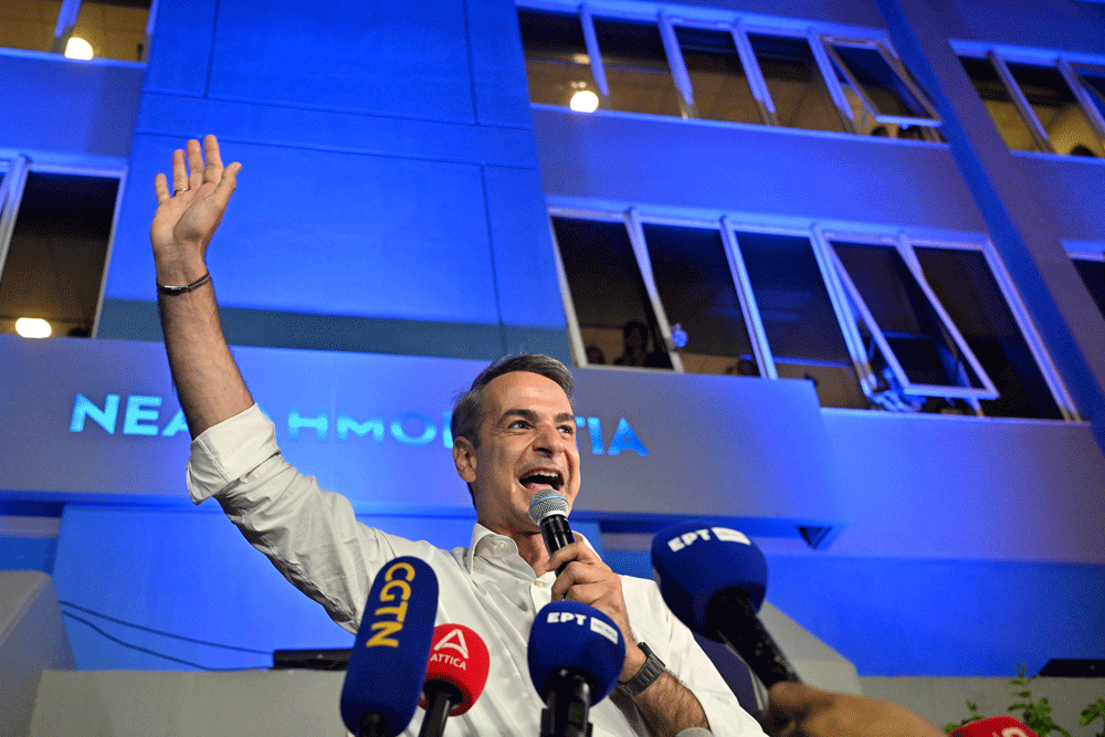 Mitsotakis back as Greek premier after election landslide