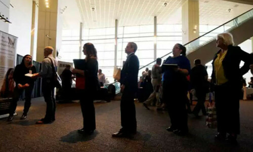 US layoffs halve in June as tech job cuts ease: report