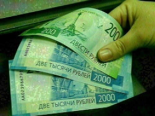 Russian rouble edges up as focus turns to expected rate increase