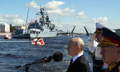 Putin reviews show of Russian naval might, says navy to get 30 new ships this year