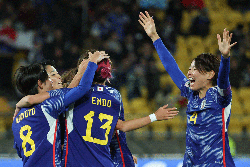 Japan hammer Spain on the break to top Group C