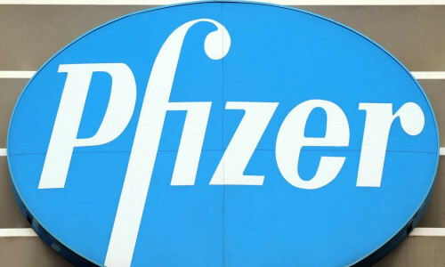 Pfizer trims 2023 revenue outlook as profits tumble