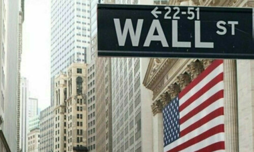 Wall Street mostly down as investors digest corporate results