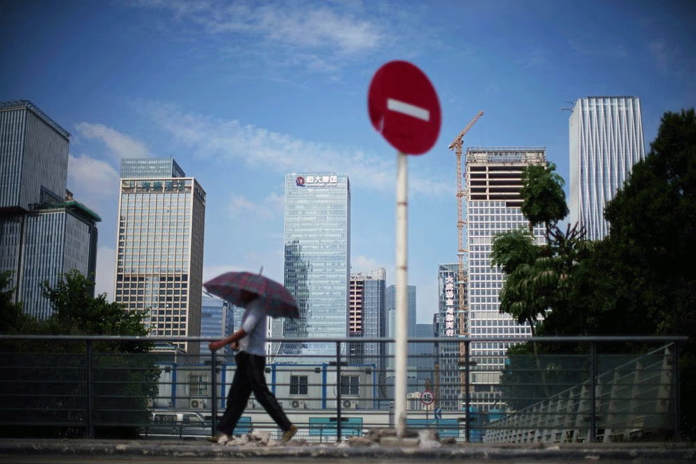 China Evergrande files for protection in US court as part of $32bn debt overhaul