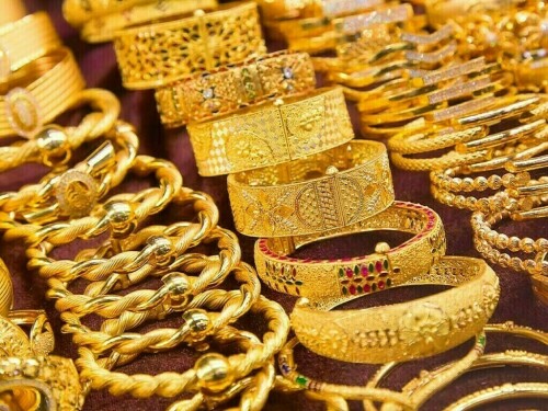 Gold rebounds from 5-month lows as US dollar, yields retreat