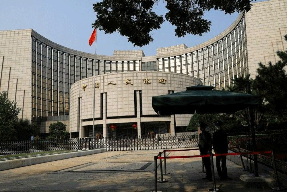 China surprises with modest rate cut amid growing yuan risks