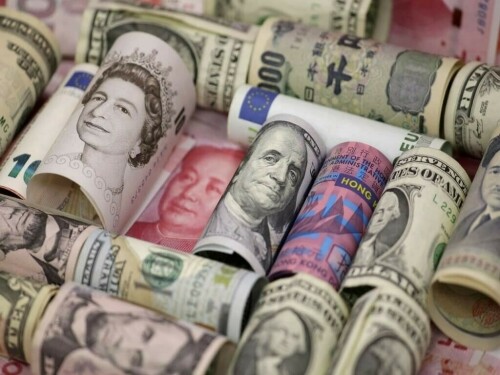 Dollar loiters at two-month peak ahead of Powell speech