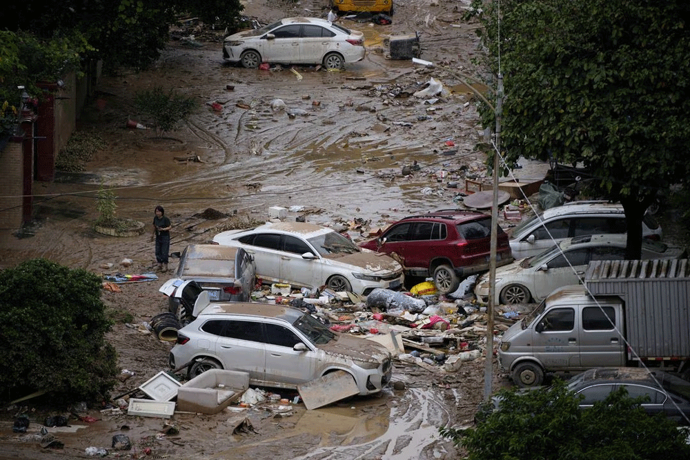 Rains from dying typhoon batter China for seventh day