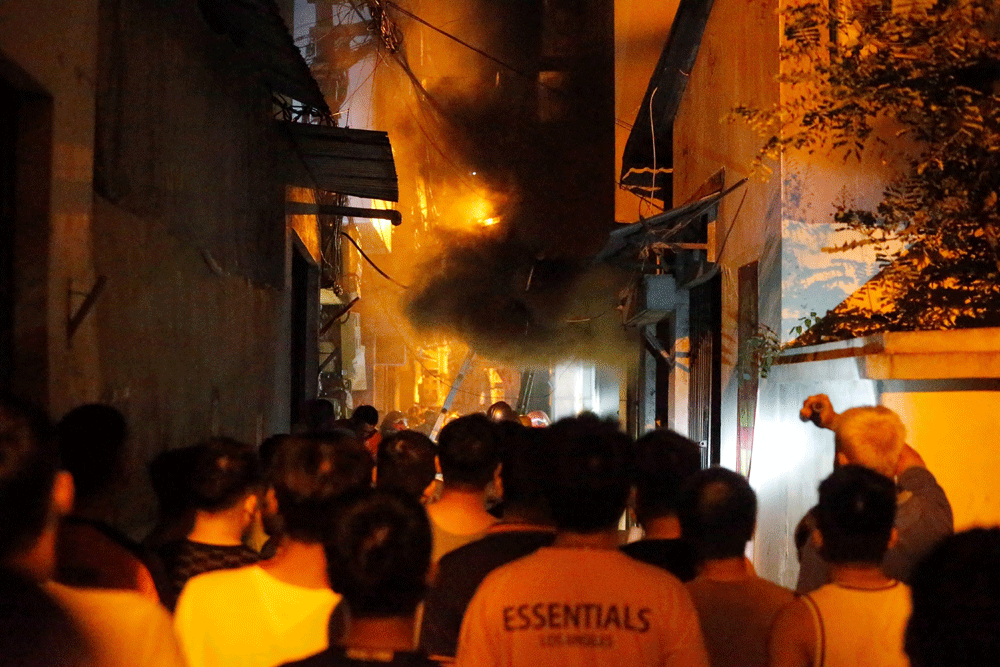 Fire at Vietnam apartment block kills 30