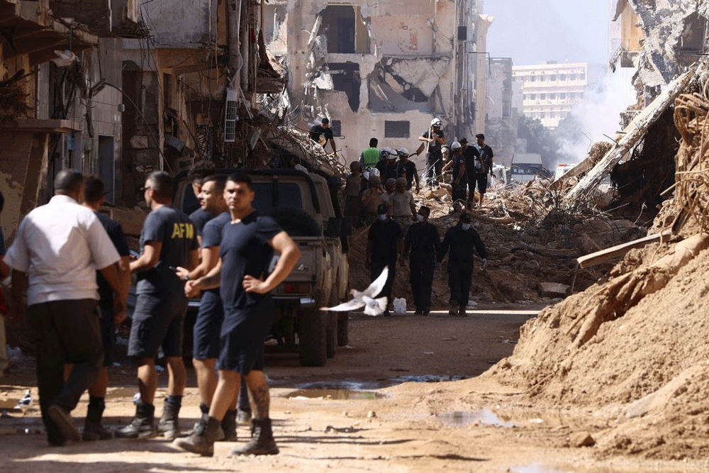 Flood-hit Libyan city facing long recovery as search for missing goes on