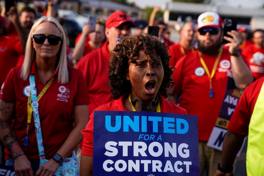 UAW strikes more GM, Stellantis facilities, cites progress in talks with Ford
