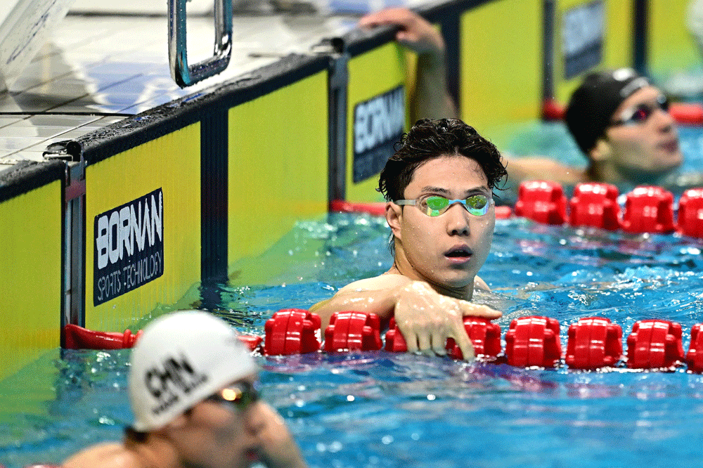 Breaststroke king Qin fires Asian Games warning