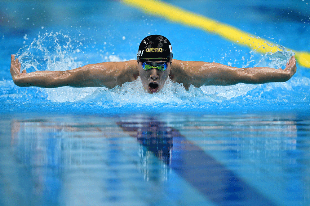 Honda stuns Seto to win Asian Games 400m medley gold