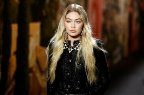Chanel shows mismatched hems and flip-flops at Paris Fashion Week
