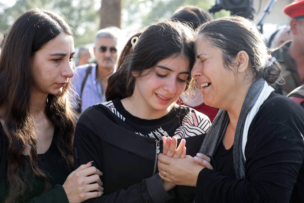 Syria buries dead after military academy drone attack