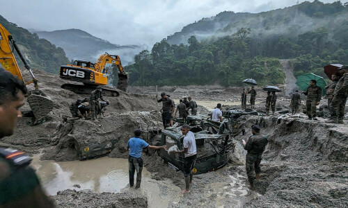 Indian rescuers struggle to reach flood-hit areas where over 100 are missing