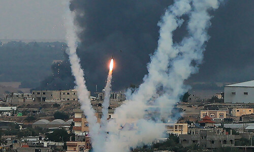 Britain withdraws families of embassy staff from Israel