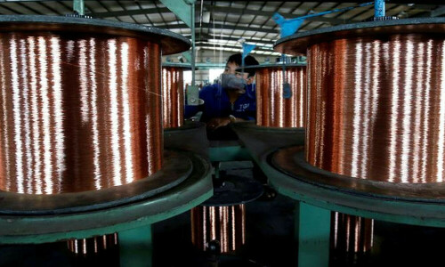 Copper plods higher on China optimism, curbed by dollar