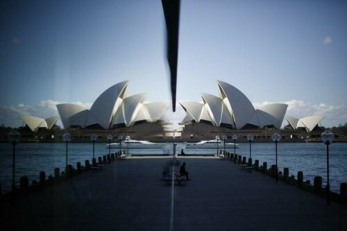 Sydney Opera House celebrates 50th birthday with light show and free tours